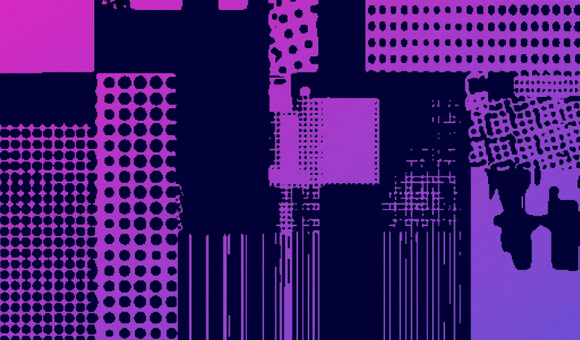 closeup of man with one hand on computer while taking notes on paper