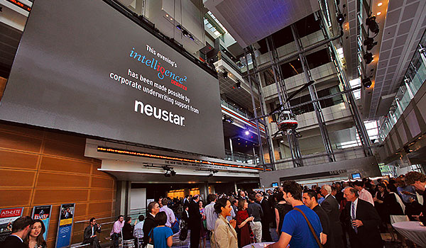 photo of interior exhibition event with lobby full of people