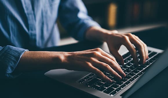 man working at laptop